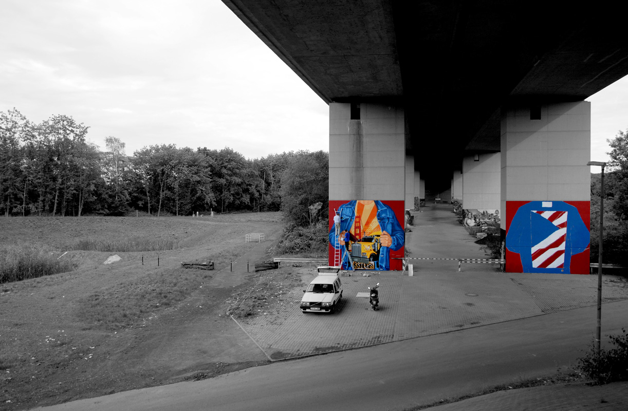 A homage to the golden state, each of both up 6 m high. In early Graffiti days Jeansjackets with a “backpiece” were very common. We choose a part of the USA flag with the other colors, filled with “Bubble Styles”.