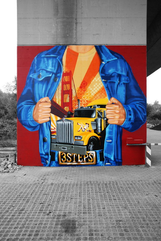 A homage to the golden state, each of both up 6 m high. In early Graffiti days Jeansjackets with a “backpiece” were very common. We choose a part of the USA flag with the other colors, filled with “Bubble Styles”.