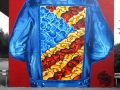 A homage to the golden state, each of both up 6 m high. In early Graffiti days Jeansjackets with a “backpiece” were very common. We choose a part of the USA flag with the other colors, filled with “Bubble Styles”.