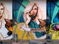 The image shows a collage of New Yorker cityscapes, a yellow taxi cab, a girl giving a phone call and classical graffiti styles from SiveOne and Doc Nova. Painted during September 2009 in Wetzlar.